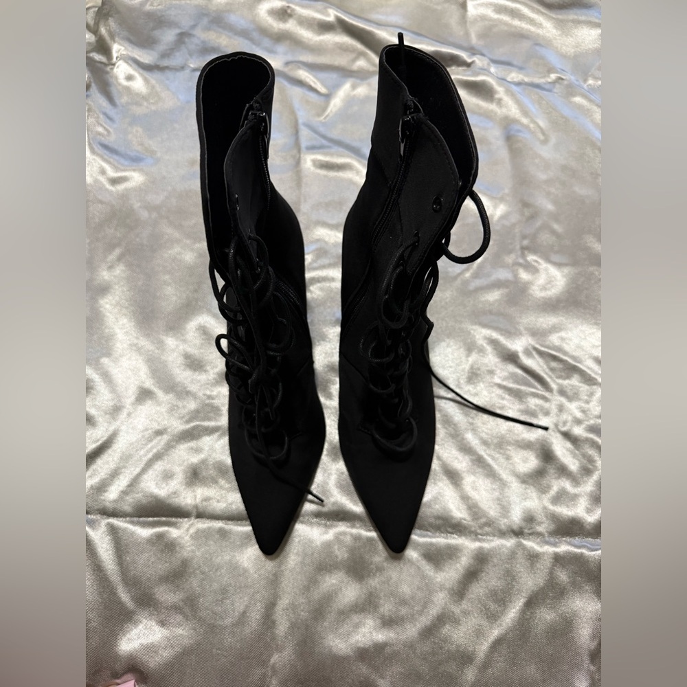 Black Point Toe Lace Up booties from Akira